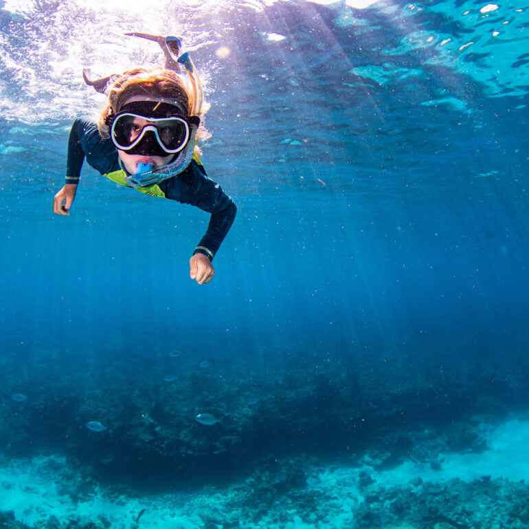 Young boy diving down